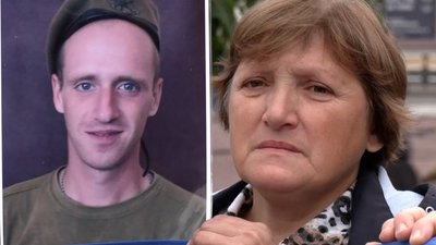 Жінка тримає портрет свого сина, який зник безвісти Жінка тримає портрет свого сина, який зник безвісти