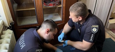 Працівники поліції на місці злочину Працівники поліції на місці злочину