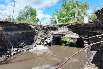 Зруйнований міст у селі Путрине Кельменецької громади через зливу, яка була зливу 12 червня Зруйнований міст у селі Путрине Кельменецької громади через зливу, яка була зливу 12 червня