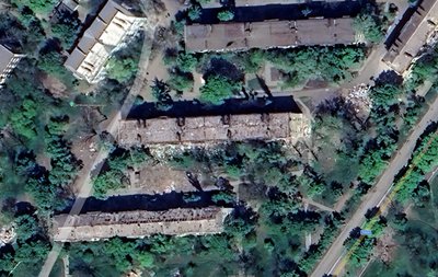 Супутникові знімки зруйнованого будинку в Маріуполі по Проспекту Нахимова Супутникові знімки зруйнованого будинку в Маріуполі по Проспекту Нахимова