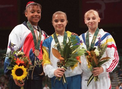 Олімпіада у фото: 10 найвизначніших подій Олімпійських ігор, що увійшли у світову та українську історію (ФОТО) Олімпіада у фото: 10 найвизначніших подій Олімпійських ігор, що увійшли у світову та українську історію (ФОТО)