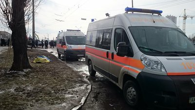 Теракт біля Палацу спорту, накритий українським прапором Ігор Толмачов Теракт біля Палацу спорту, накритий українським прапором Ігор Толмачов
