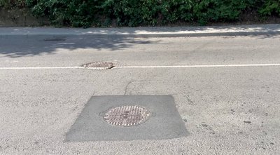 Ділянки поблизу люків на вулиці Кармелюка у Чернівцях відремонтували не за гарантією після капремонту: чому Ділянки поблизу люків на вулиці Кармелюка у Чернівцях відремонтували не за гарантією після капремонту: чому