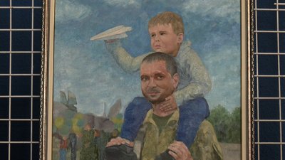 Портрет Руслана Білоуса з сином Портрет Руслана Білоуса з сином