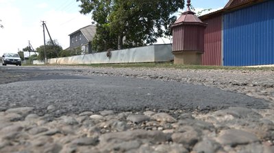 ямковий ремонт дороги у селі Котелеве ямковий ремонт дороги у селі Котелеве