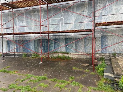 У Житомирі розпочинають демонтаж мозаїки з фасаду кінотеатру "Космос" У Житомирі розпочинають демонтаж мозаїки з фасаду кінотеатру "Космос"