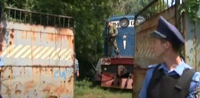 Поїзд, на якому до Харкова привезли загиблих внаслідок збиття малайзійського боїнга на Донбасі, заїхав на завод імені Малишева, 22 липня 2014 року Поїзд, на якому до Харкова привезли загиблих внаслідок збиття малайзійського боїнга на Донбасі, заїхав на завод імені Малишева, 22 липня 2014 року