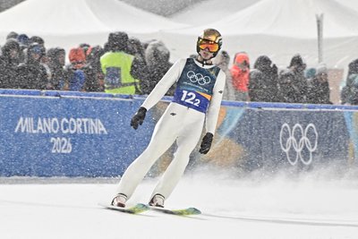Каспер Томащак після виконаного останнього стрибка на Олімпіаді-2026 Каспер Томащак після виконаного останнього стрибка на Олімпіаді-2026