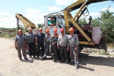 Бригада "Харківобленерго", яка працює над відновленням світла у Кам'янці на Ізюмщині, липень 2024 року
