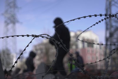 Поліцейські на місці влучання російського дрона у Харкові Поліцейські на місці влучання російського дрона у Харкові