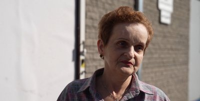 «Щоб вони всі згоріли вогнем таким же, як ми горіли»: що відбувається на місці удару по ТЦ у Дніпрі на другий день