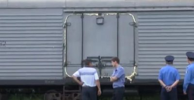 Поїзд, на якому до Харкова привезли загиблих внаслідок збиття малайзійського боїнга на Донбасі, 22 липня 2014 року Поїзд, на якому до Харкова привезли загиблих внаслідок збиття малайзійського боїнга на Донбасі, 22 липня 2014 року
