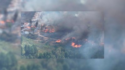 Згорілі будинки в селі Єліне Згорілі будинки в селі Єліне
