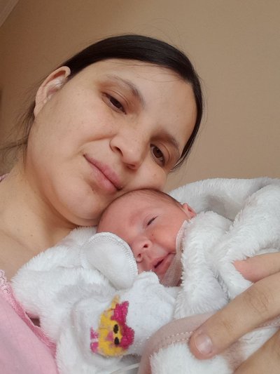 Жінка з новонародженим сином Жінка з новонародженим сином