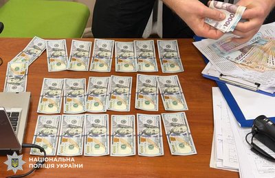 Гроші, які вилучили під час затримання Гроші, які вилучили під час затримання