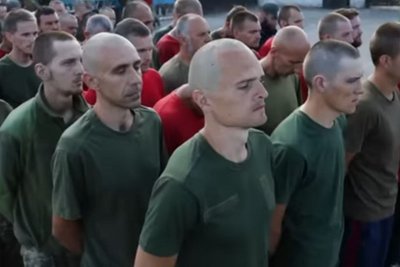 Кадр з російського пропагандистського фільму "Нацистські карателі" на якому є Ігор Калініченко Кадр з російського пропагандистського фільму "Нацистські карателі" на якому є Ігор Калініченко