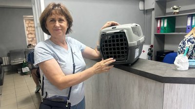 Жителька Купʼянська Олена та кіт Серьожка