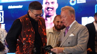 Френк Уоррен і Олександр Усик