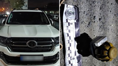 Позашляховик підприємця та виявлена під ним граната на розтяжці
