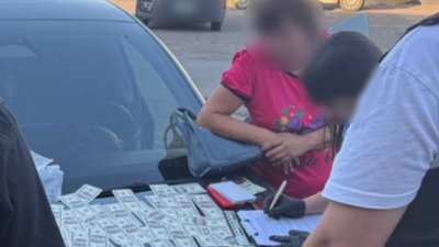Фото з місця повідомлення про підозру