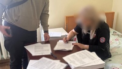 збитки на закупівлі сміттєвозів, Нікополь, підозрюють посадовицю КП