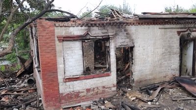 зміїв, пошкоджений будинок
