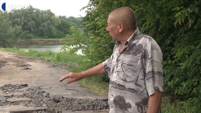 В селі на Черкащині негода змила асфальтне покриття В селі на Черкащині негода змила асфальтне покриття