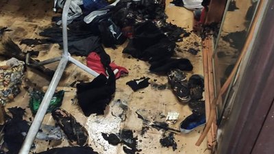 Облив бензином та намагався спалити сусідку
