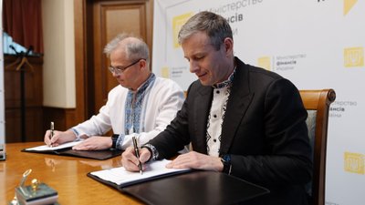 Сергій Марченко, Кевін Томлінсон