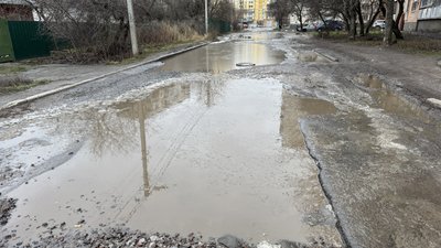вулиця, ями, калюжі вулиця, ями, калюжі