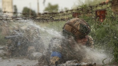 Жінки 128 бригади пройшли випробування на право носити берет кольору ґрунту Жінки 128 бригади пройшли випробування на право носити берет кольору ґрунту