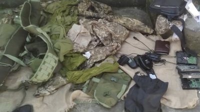 Окупанти знайшли у двох кримчан схованки зі зброєю та нібито українською формою Окупанти знайшли у двох кримчан схованки зі зброєю та нібито українською формою