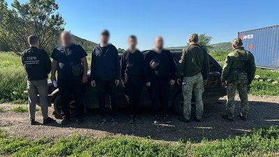 Затримані чоловіки
