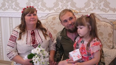 Анастасія та Володимир з донькою