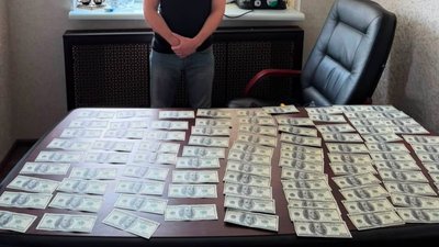 Гроші, вилучені в підозрюваного жителя Пісочина, 11 червня 2026 року Гроші, вилучені в підозрюваного жителя Пісочина, 11 червня 2026 року