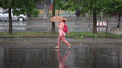 Херсонщина, дощ, погода, парасолька