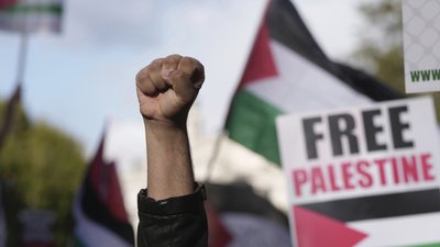 Протестувальники беруть участь у пропалестинській демонстрації в Лондоні, 14 жовтня 2023