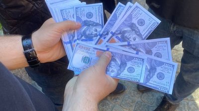 Гроші, вилучені в підозрюваного