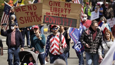 "Дай мені свободу або дай COVID". У США відбулися акції проти карантину
