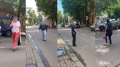 Люди, які переходять дорогу у невстановленому місці Люди, які переходять дорогу у невстановленому місці