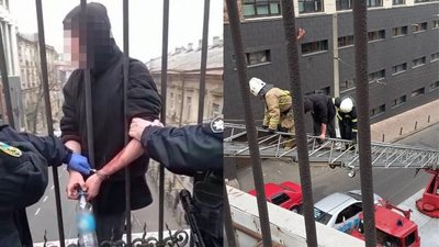 Стояв за огорожею мосту: в Одесі поліцейські врятували хлопця від самогубства