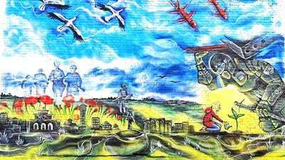Поле з маками, а за ним — полеглі Герої: в місті на Волині з'явився патріотичний мурал Поле з маками, а за ним — полеглі Герої: в місті на Волині з'явився патріотичний мурал