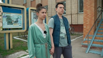 Подруга загиблої родини киян Марія Закалюжна з чоловіком