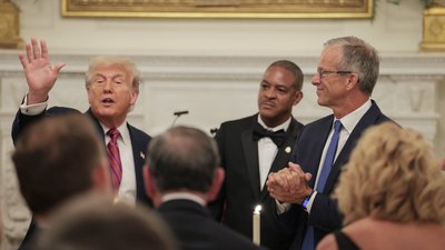 Джон Тун і Дональд Трамп