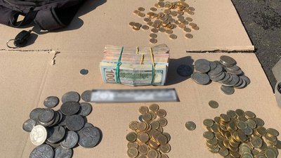 Росіянин продав жителю Чернігівщини фейкових монет на півмільйона гривень