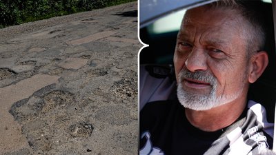 Дорога з вибоїнами та водій автомобіля