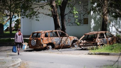 Херсон, авто, обстріли, жінка, вулиця