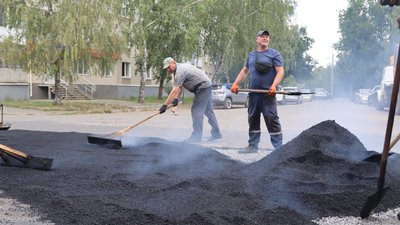 Ремонт дороги в Охтирці