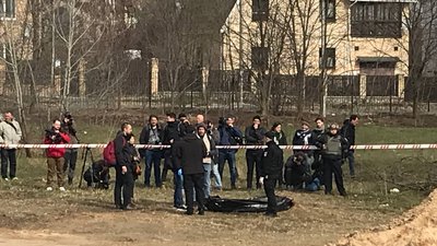 У Бучі почали ексгумацію тіл з братської могили біля церкви Андрія Первозванного