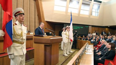 Сергій Аксьонов, під час засідання Державної Ради Республіки Крим в Сімферополі, жовтень, 2014 року. Депутати самопроголошеного Держради Криму підтримали кандидатуру Аксьонова на посаду "голови республіки" Сергій Аксьонов, під час засідання Державної Ради Республіки Крим в Сімферополі, жовтень, 2014 року. Депутати самопроголошеного Держради Криму підтримали кандидатуру Аксьонова на посаду "голови республіки"